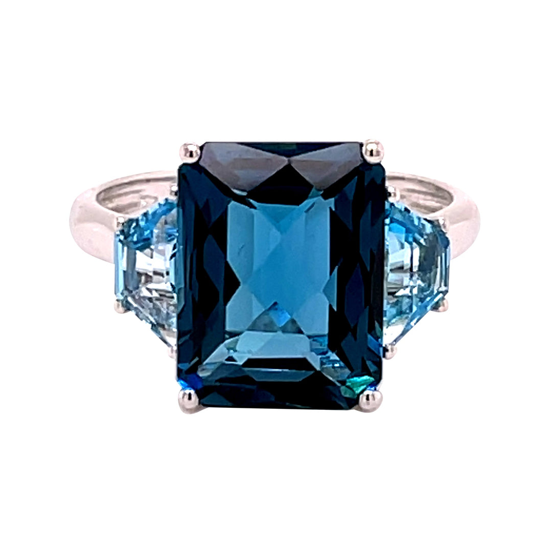 14k white gold
2 blue topaz = 1.20cts.
1 London blue topaz = 6.10cts.