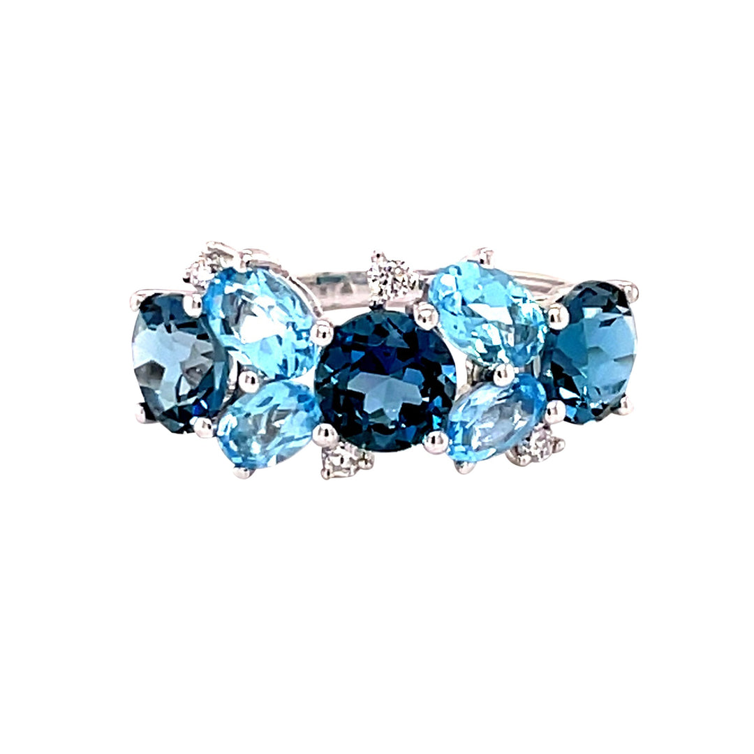 14k white gold
3 London blue topaz = 3.40cts.
4 blue topaz = 1.60cts.
4 diamonds = 0.10ct.
