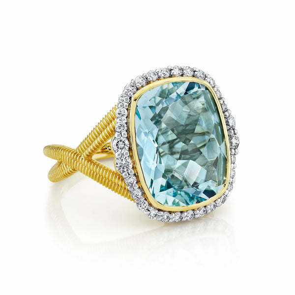 Sloan Street 18 Karat Yellow Gold Sky Blue Topaz and Diamond Halo Ring with Criss-Cross Strie Shank, BT=9.73ct, 32Dias.=.42tw