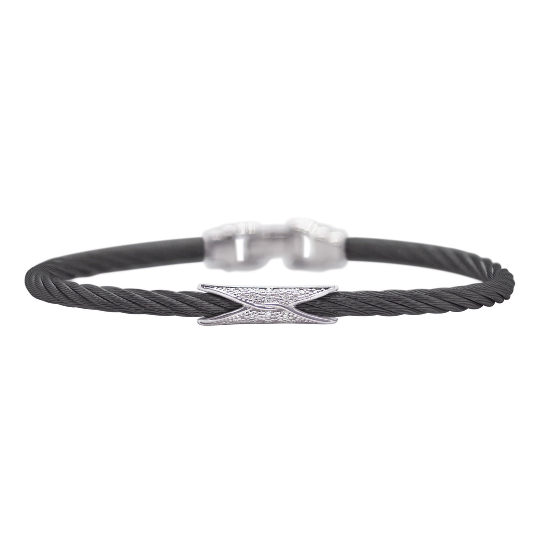 Black Cable Slim 3mm Hourglass Bracelet with 18kt Gold & Diamonds
Cable, 18 karat White Gold, 0.07 total carat weight Diamonds and stainless steel. Pull back clasp.