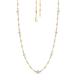 Roberto Coin 18 karat yellow and white gold diamond by the inch 7 station dog bone necklace 16", D=0.28tw