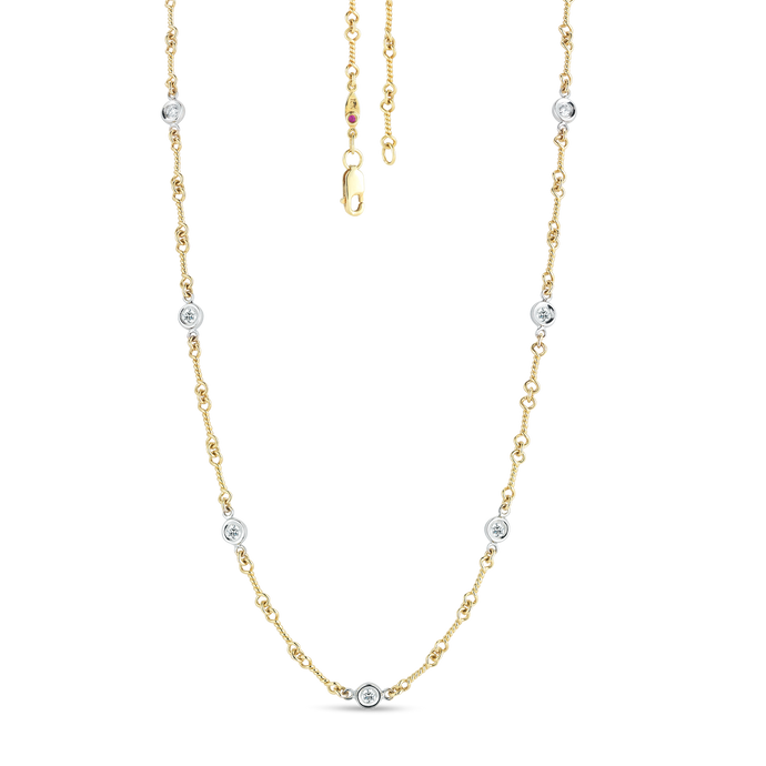 Roberto Coin 18 karat yellow and white gold diamond by the inch 7 station dog bone necklace 16