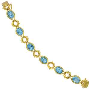 Estate 18 karat Yellow Gold and Blue Topaz Bracelet, Blue Topaz @ 30ctw