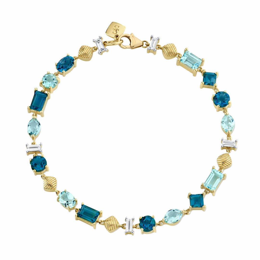 Sloane Street 18 karat yellow gold multi shape Blue Topaz and Diamond Bracelet, Blue Topaz 8.94ctw, D=0.50ctw G/SI